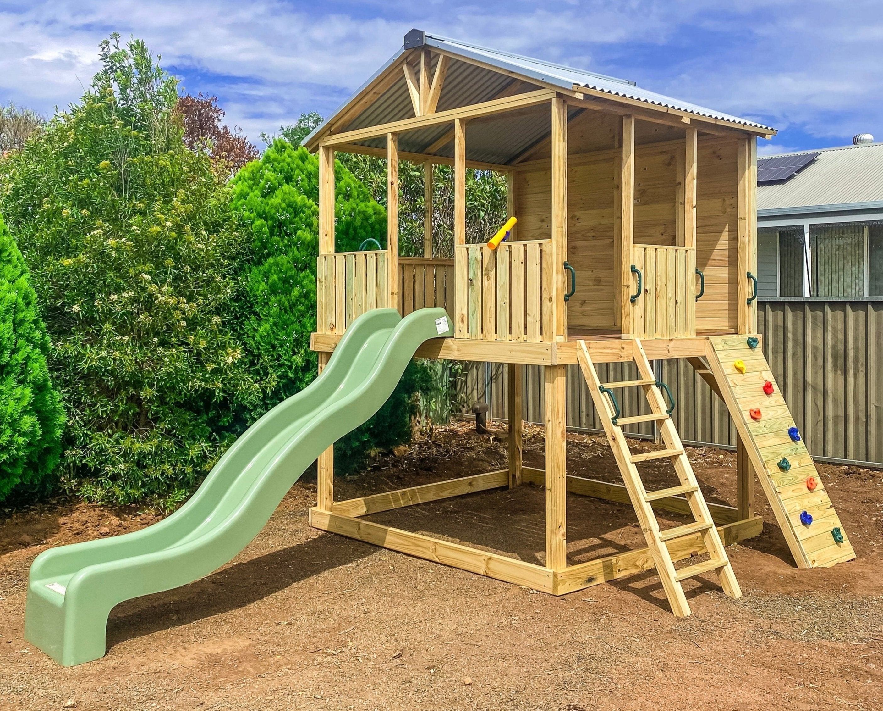 Wooden cubby house with slide cheap